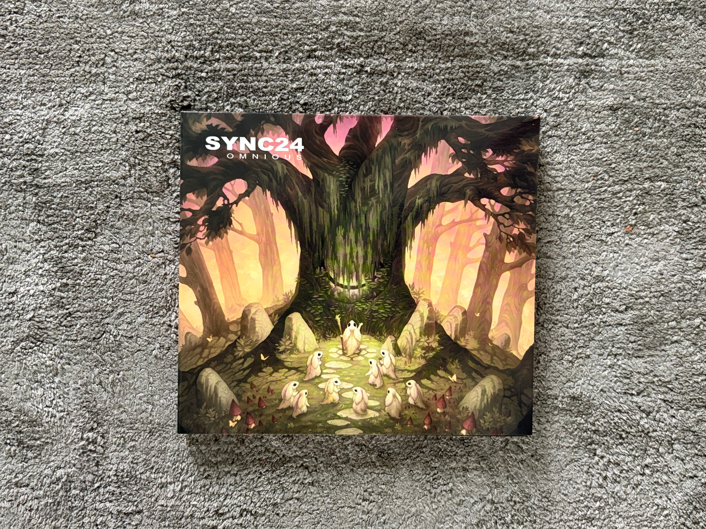 Sync24 - Omnious 6 panel Digipack